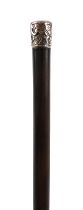 Hardwood walking stick with floral engraved white metal pommel and brass ferule, 87cm in length
