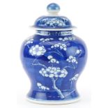 Chinese hand painted blue and white prunus ginger jar and cover, character mark to the base, 22cm