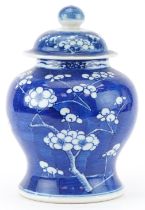 Chinese hand painted blue and white prunus ginger jar and cover, character mark to the base, 22cm