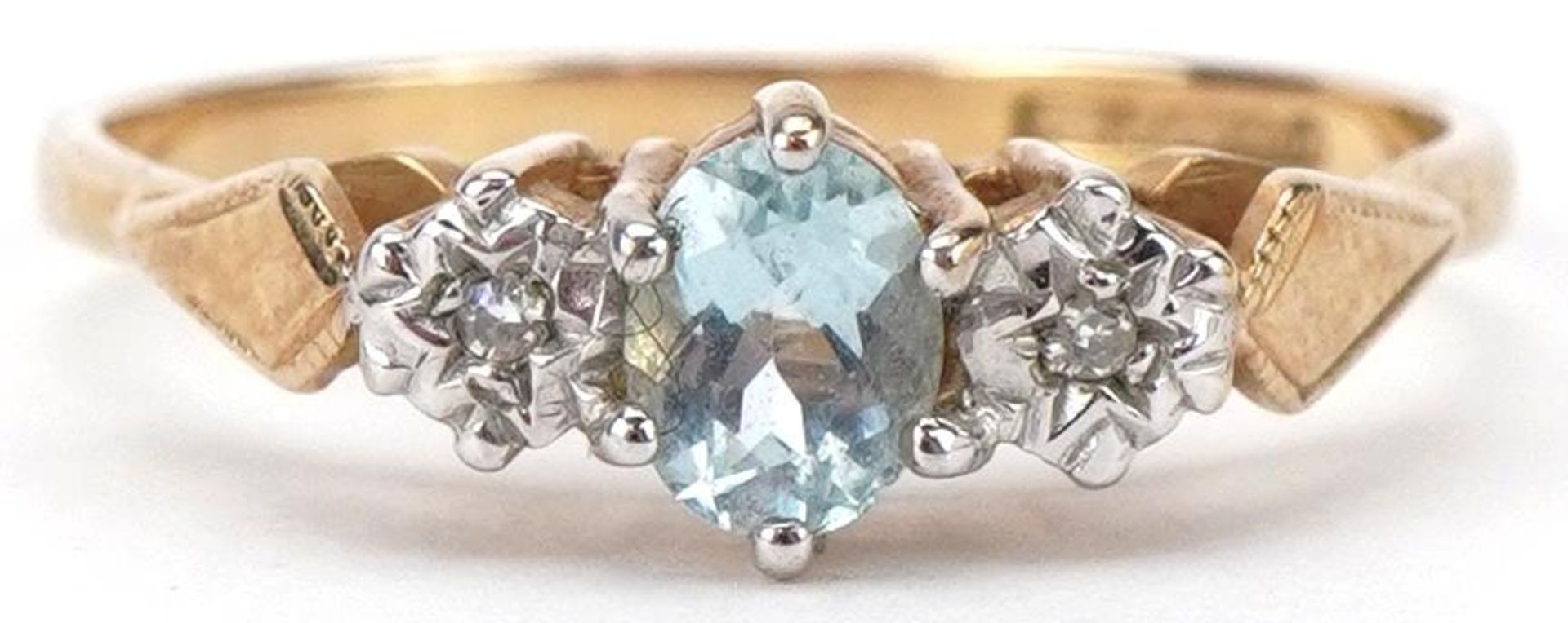 9ct gold blue stone and diamond three stone ring, size P, 1.8g
