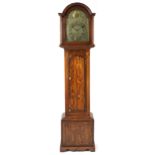 19th century oak longcase clock with brass face having a circular dial with Roman and Arabic