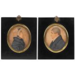Pair of Georgian oval hand painted portrait miniatures of a male and female housed in ebonised
