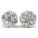 Pair of 9ct white gold diamond flower head stud earrings, each earring stamped 1.00ct, approximately