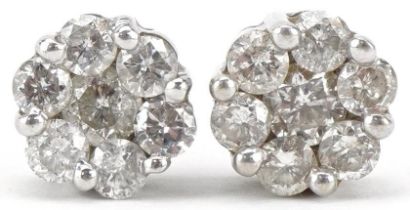 Pair of 9ct white gold diamond flower head stud earrings, each earring stamped 1.00ct, approximately