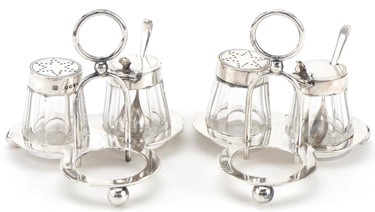 Hukin & Heath, two Victorian silver cruet sets on stand with glass jars, London 1885, each 8cm high, - Image 3 of 6