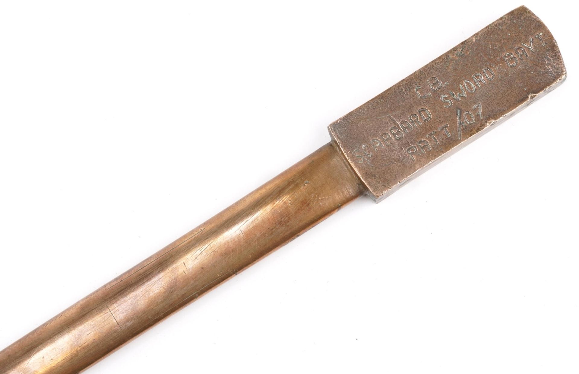 Military interest World War I bronze C B scabbard, sword and bayonet quality checker, patt/07,