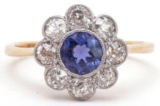 18ct gold diamond and sapphire flower head ring housed in a W Bruford & Son Ltd Eastbourne