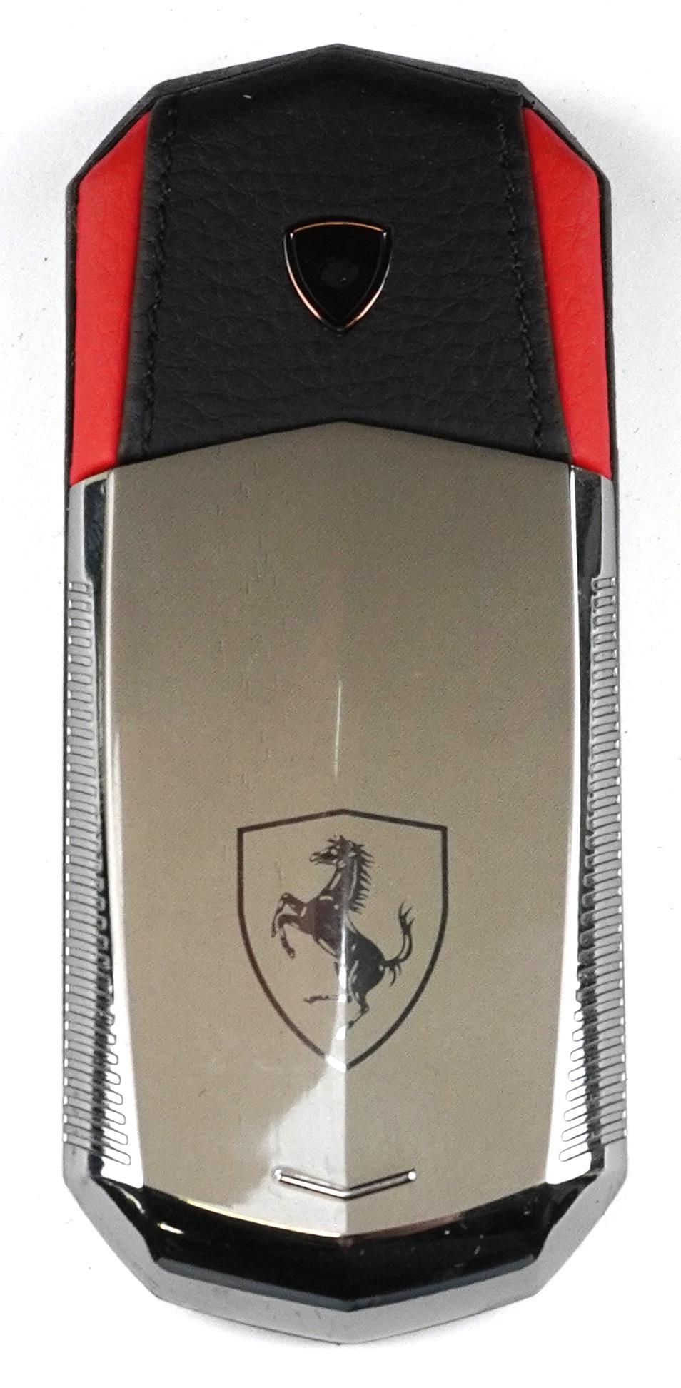 Cased Vertu Ferrari mobile phone and accessories - Image 5 of 6