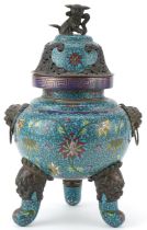 Chinese patinated bronze tripod censer with pierced cover and qilin knop, profusely enamelled with