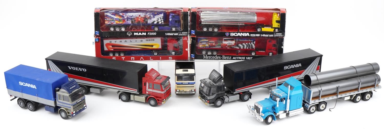 Collection of model articulated lorries, some with boxes including NewRay Mercedes Benz Iveco,