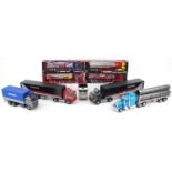Collection of model articulated lorries, some with boxes including NewRay Mercedes Benz Iveco,