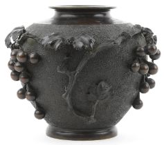 Japanese bronze vase relief moulded with grapes and vines, impressed signature to the base, 23cm