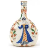 Turkish Ottoman Kutahya water flask hand painted with figures amongst flowers, 22cm high