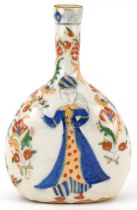 Turkish Ottoman Kutahya water flask hand painted with figures amongst flowers, 22cm high