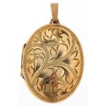 9ct gold floral engraved oval locket, 4cm high, 4.2g