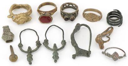 Archeological interest Middle Eastern and ancient metal artefacts including a fibula brooch,