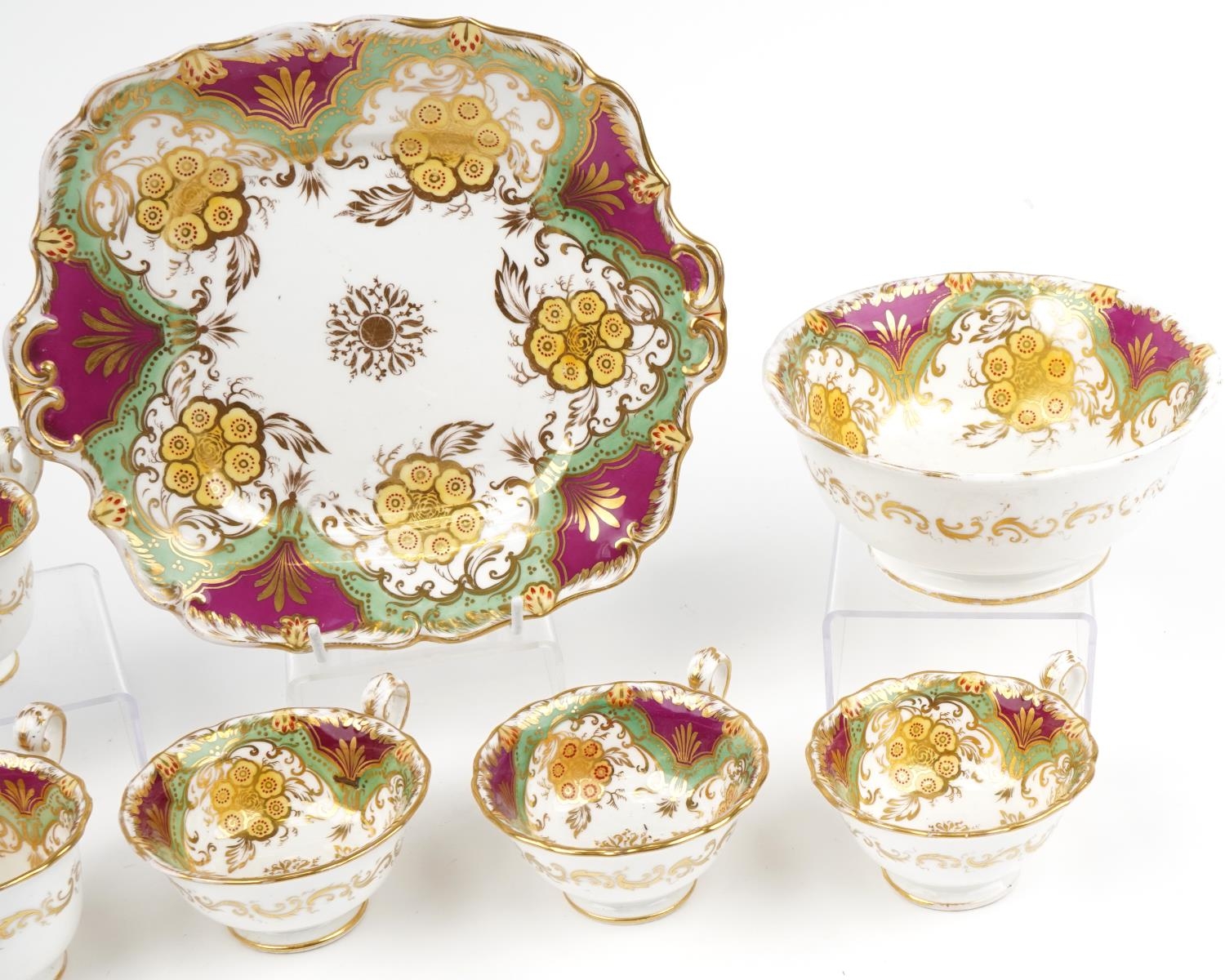 Victorian teaware hand painted and gilded with flowers, seven cups, slop bowl and side plate, the - Image 3 of 4