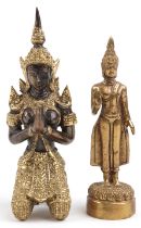 Two Thai gilt metal figures of Buddha including a kneeling example, the largest 12cm high