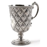Martin, Hall & Co, Victorian aesthetic silver pedestal cup embossed with stylised flowers, Sheffield