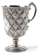 Martin, Hall & Co, Victorian aesthetic silver pedestal cup embossed with stylised flowers, Sheffield