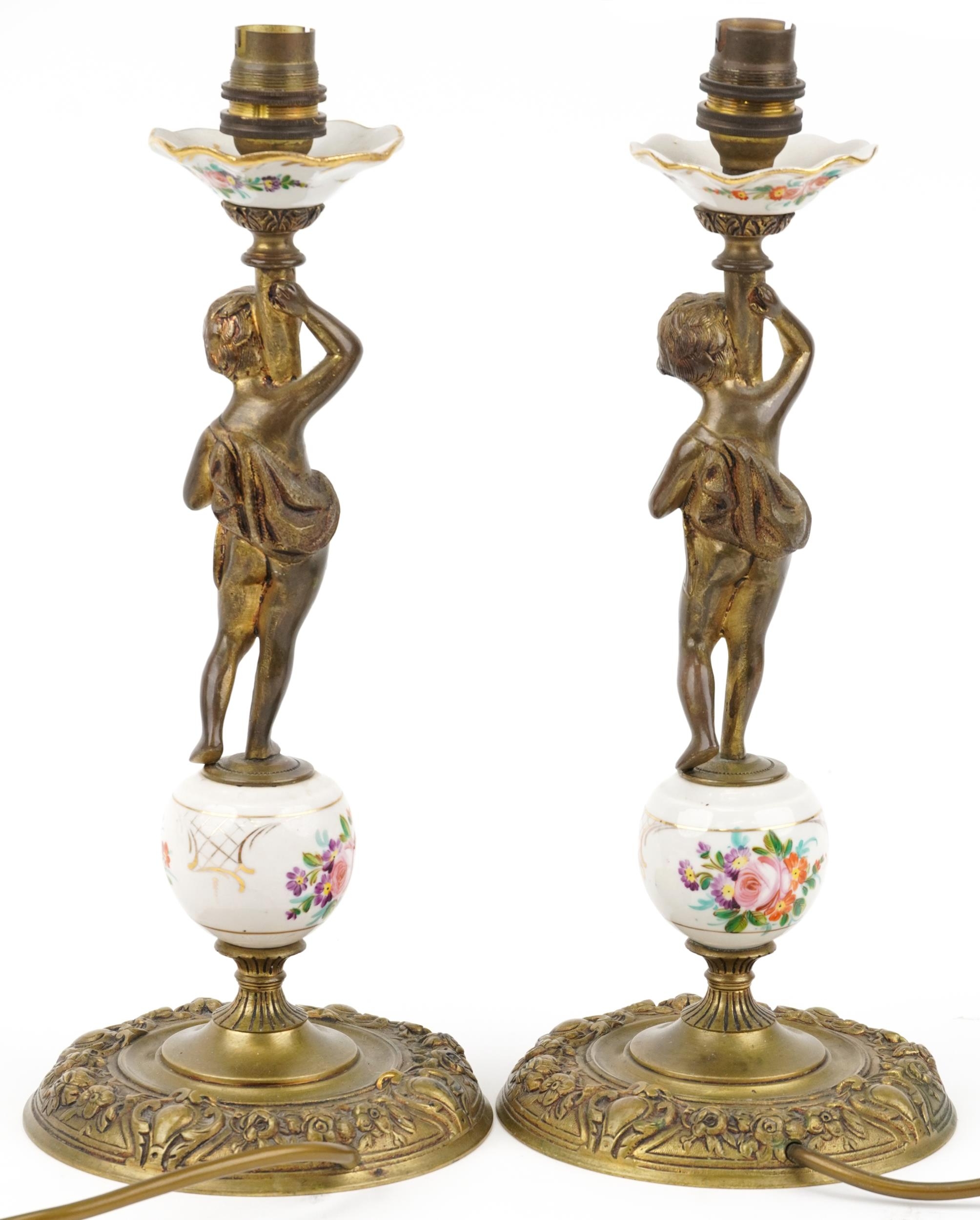 Pair of gilt brass and porcelain Putti design candlesticks hand painted with flowers, each 35cm high - Image 2 of 3