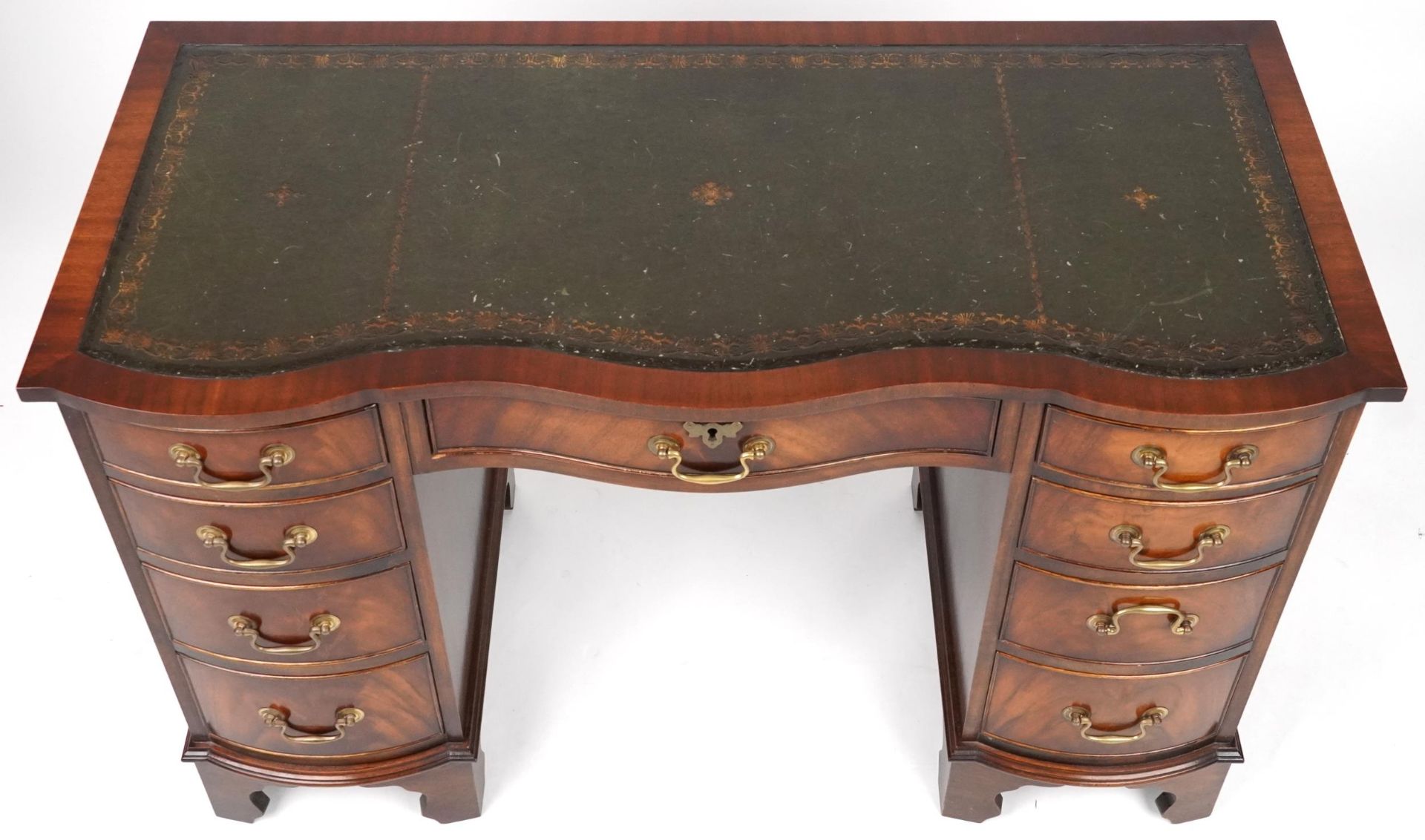 Mahogany serpentine front twin pedestal desk and a mahogany chair, the desk with nine drawers and - Image 4 of 9