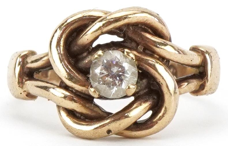 9ct gold knot design ring set with a clear stone, size P, 5.2g