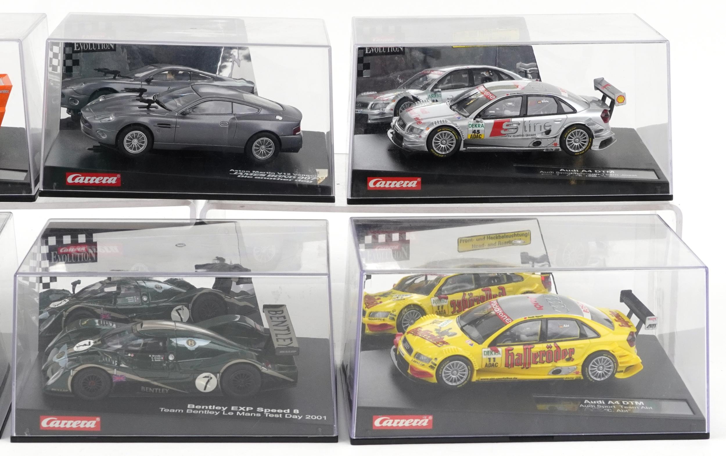 Six Carrera Evolution slot cars with cases comprising Porsche 935, Aston Martin V12 Vanquis, Audi A4 - Image 3 of 3