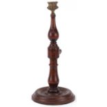 Victorian mahogany and brass rise and fall candlestick with brass sconce, 31cm when closed