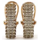 Pair of 9ct gold diamond three row half hoop earrings, each 1.7cm high, total 3.0g