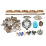 Antique and later jewellery including a heavy silver charm bracelet with a large collection of