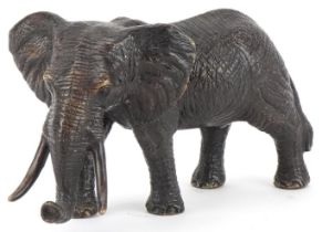 Japanese patinated okimono of a bull elephant, 30cm in length