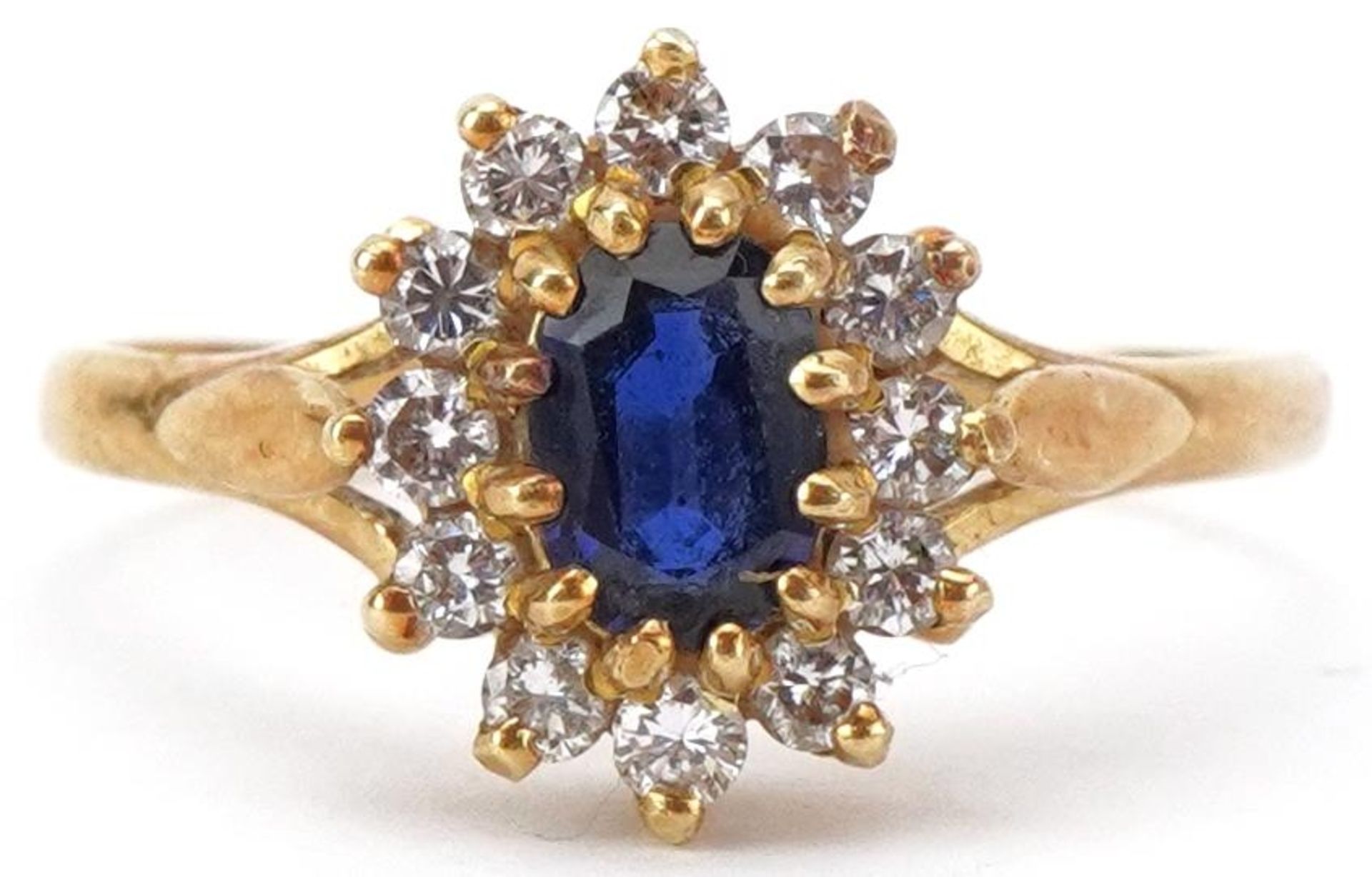 18ct gold diamond and sapphire cluster ring, size P/Q, 3.6g