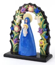 Lenci, Italian Art Deco porcelain statuette of Madonna and child under a floral arch, part paper