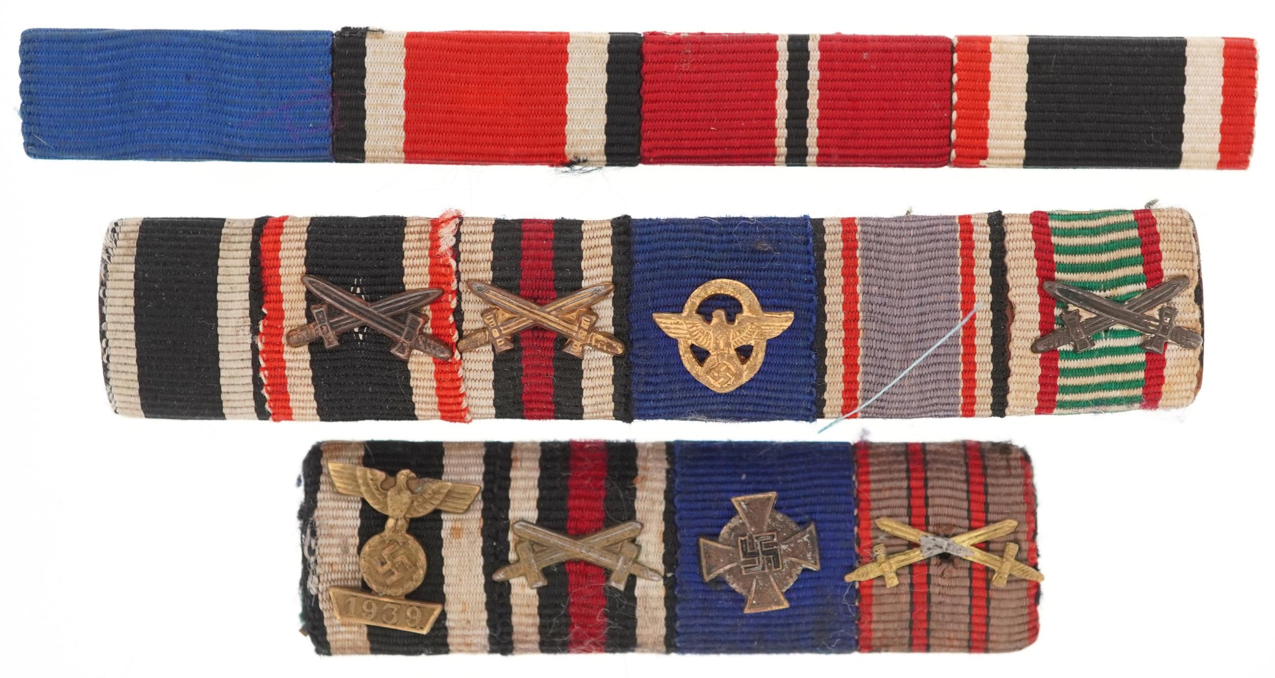 Three British military medal bars including Mentioned in despatches, the largest 10cm in length