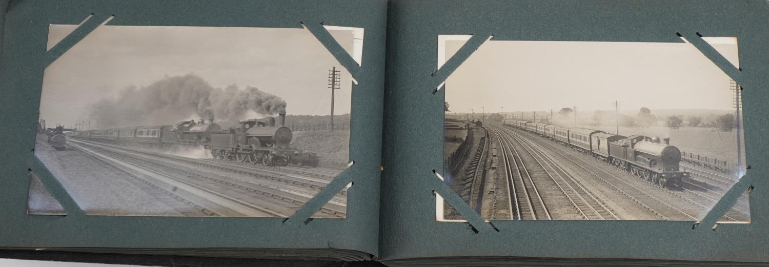 Railway items including postcards of trains arranged in two albums, British Railways torch and a - Image 11 of 15
