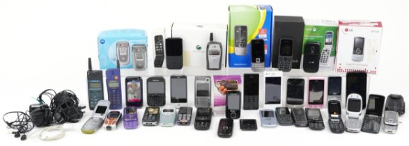 Vintage and later mobile phones, some with boxes including Sony, LG, Samsung and HTC