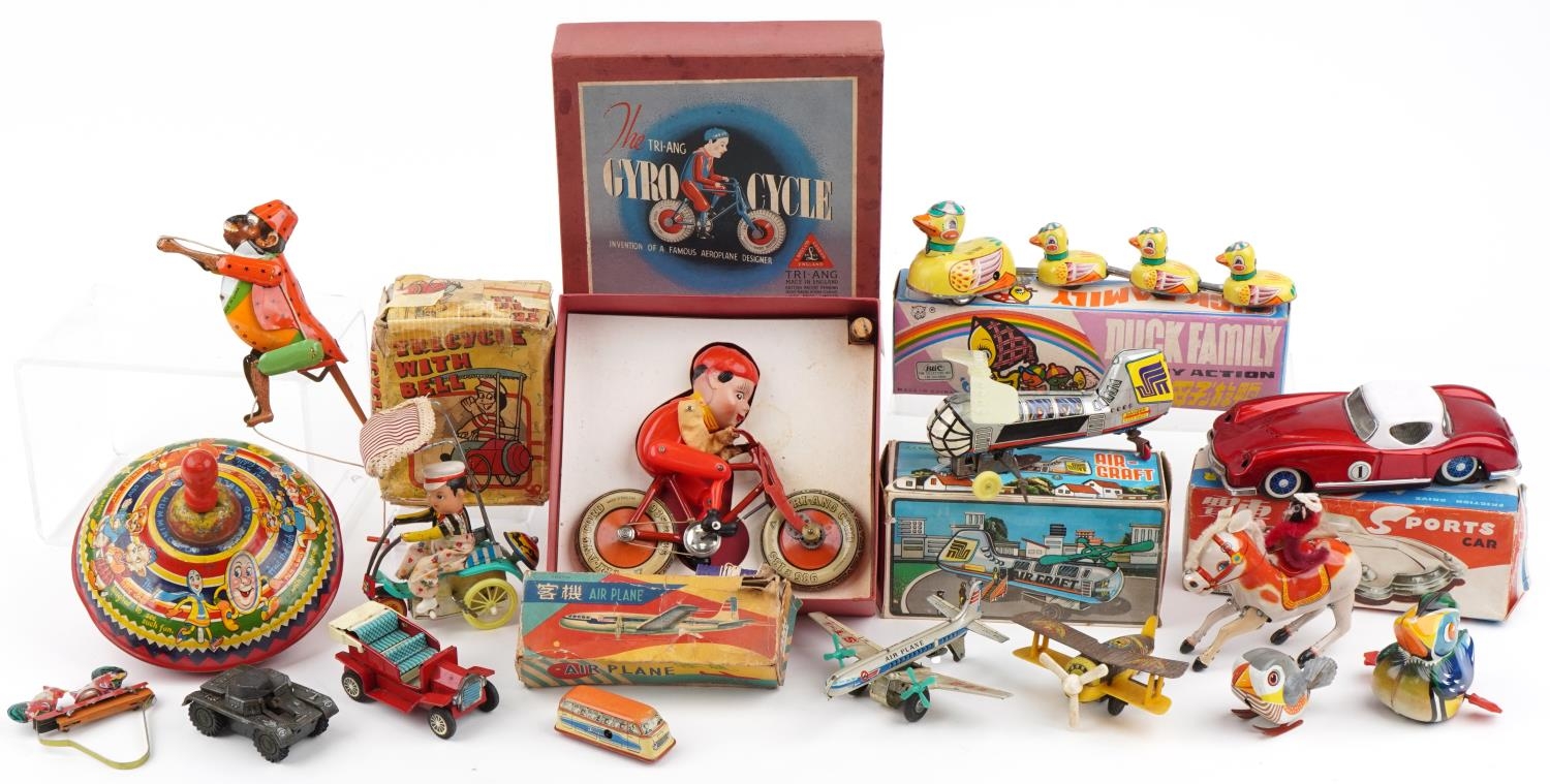 Vintage and later tinplate toys including Tri-ang Giro Cycle with box, Japanese friction driven