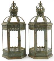 Pair of partially gilt bronzed hanging lanterns, each 62cm high