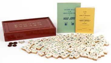 Early 20th century Chinese bone and bamboo mahjong set with hardwood case and booklets