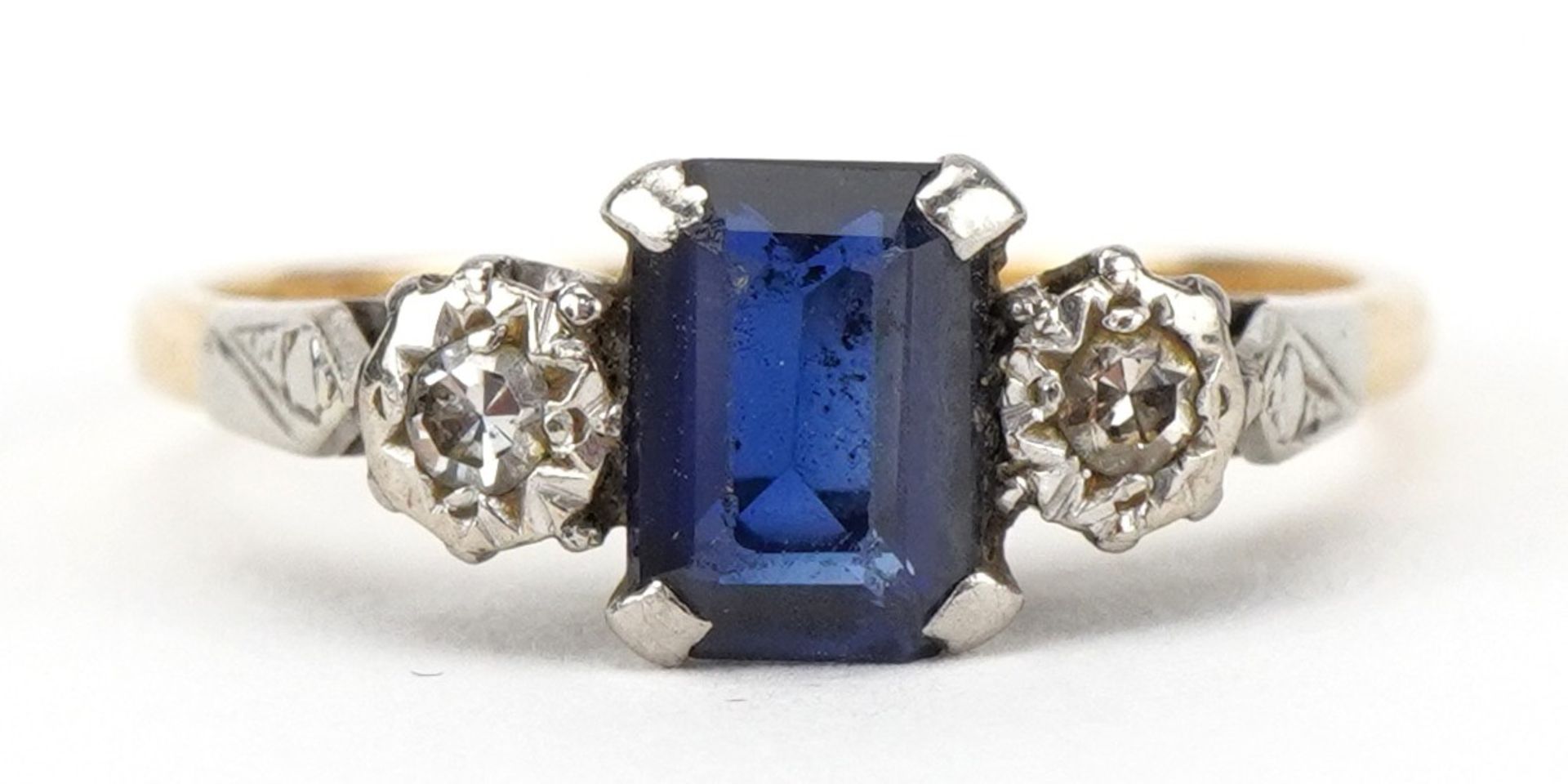 Art Deco 18ct gold and platinum sapphire and diamond ring, the sapphire approximately 7.10mm x 5.0mm