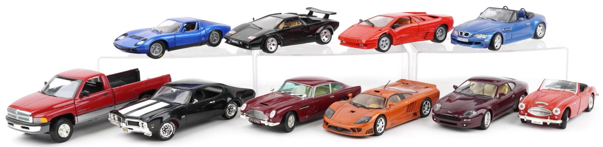 Ten 1:18 scale diecast vehicles including Maisto, Lamborghini Diablo, Lamborghini Countach and Aston