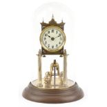 Early 20th century brass anniversary clock under a glass dome numbered 78150 to the back plate, 30cm