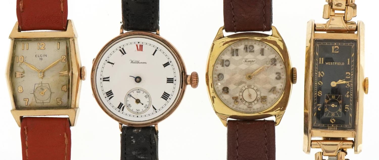 Four vintage gentlemen's gold plated wristwatches comprising Waltham, Westfield, Elgin 19 and Tempo,