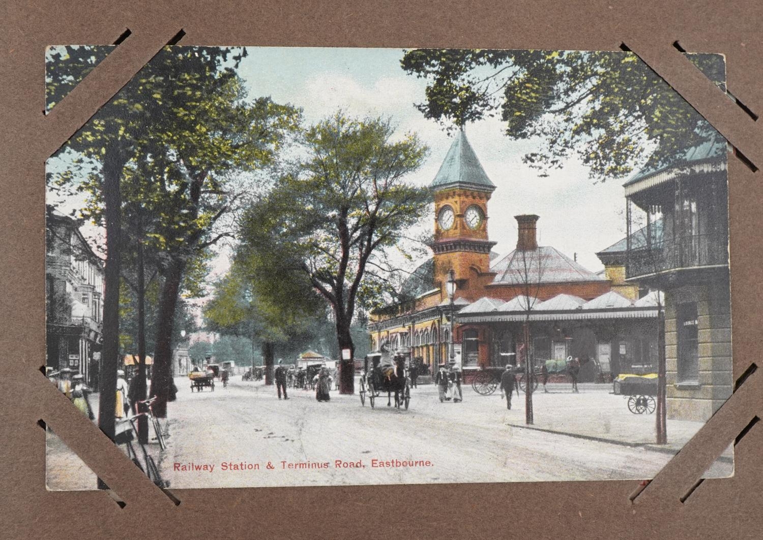 Local interest and railwayana postcards arranged in an album including Eastbourne Railway Station - Image 2 of 13