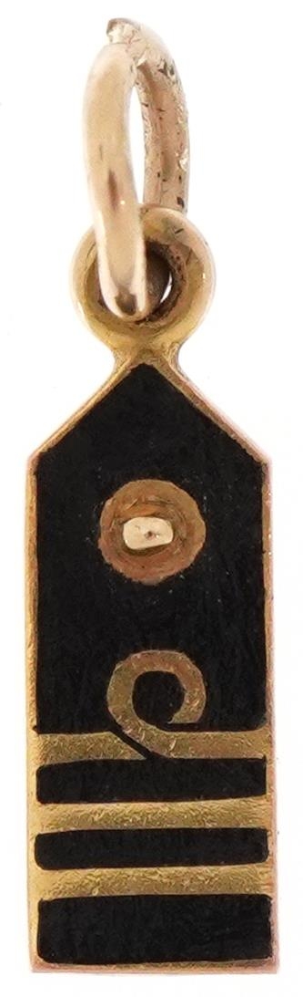 9ct gold and enamel charm in the form of a luggage tag, 1.7cm high, 1.1g