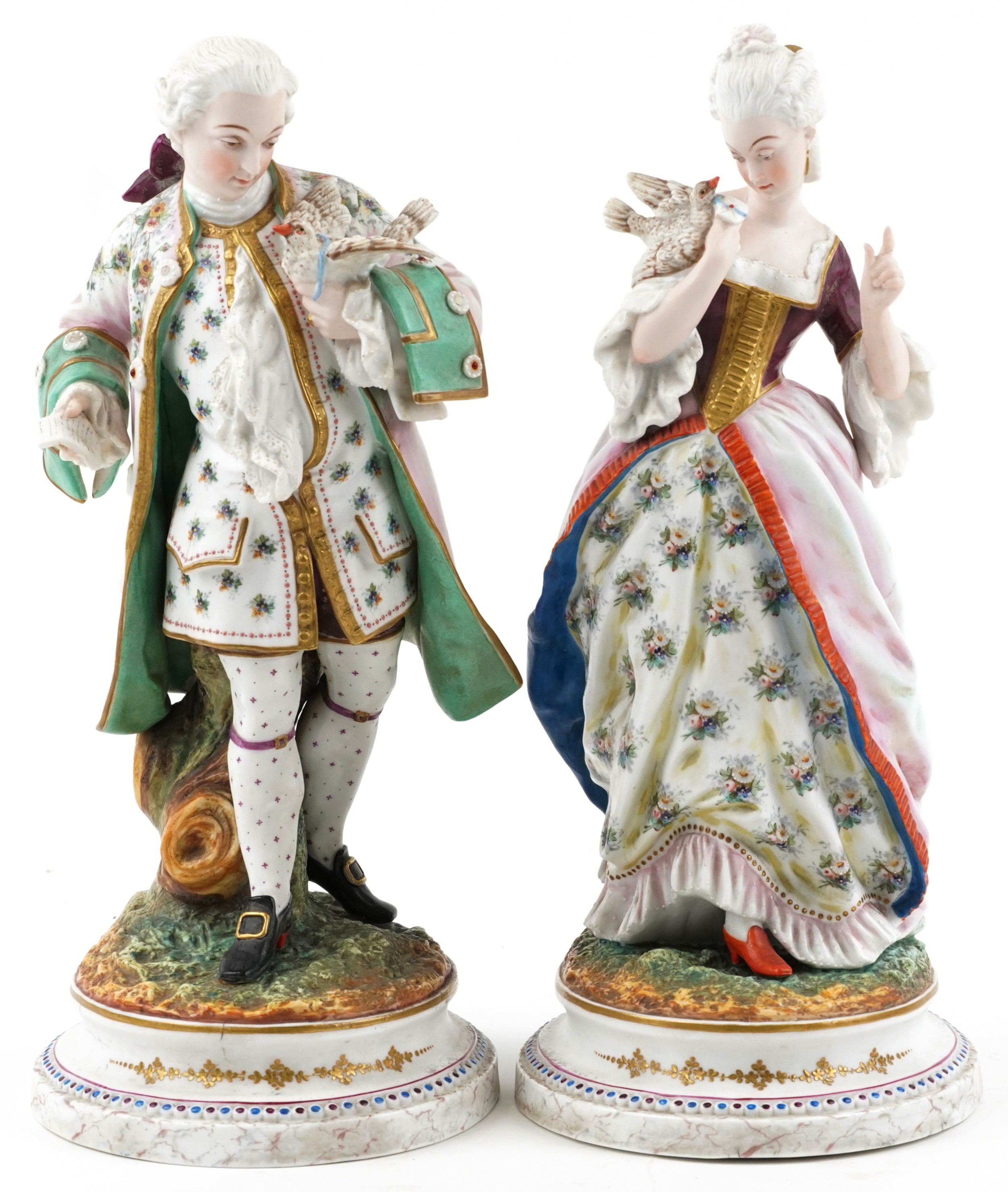 Pair of large 19th century French bisque porcelain figures of bird catchers, impressed AM factory