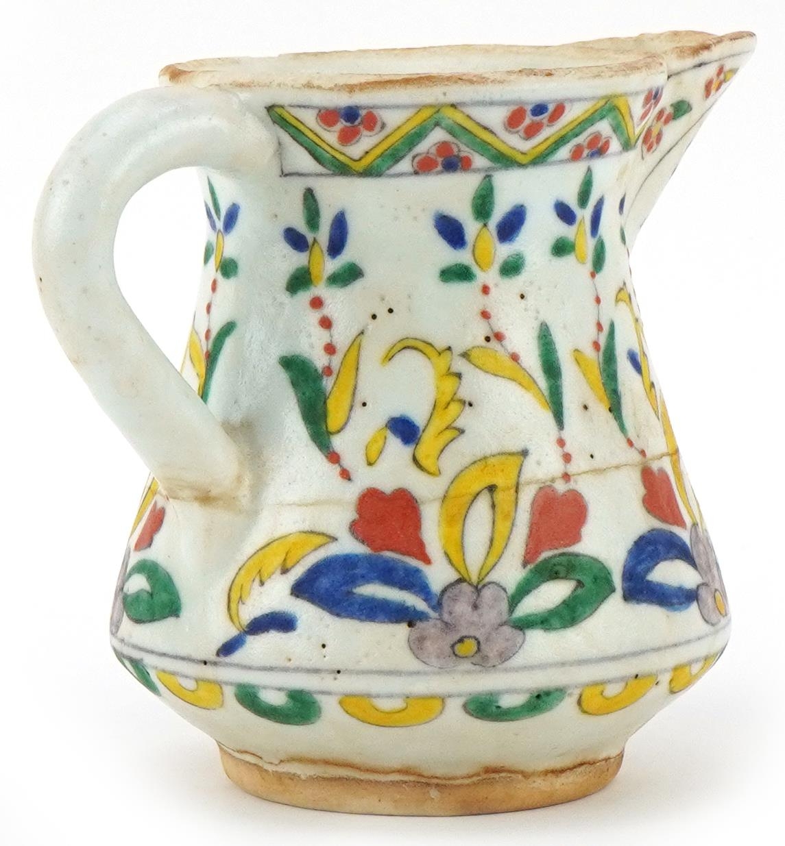 Turkish Ottoman Kutahya milk jug hand painted with stylised flowers, 11cm high - Image 2 of 3