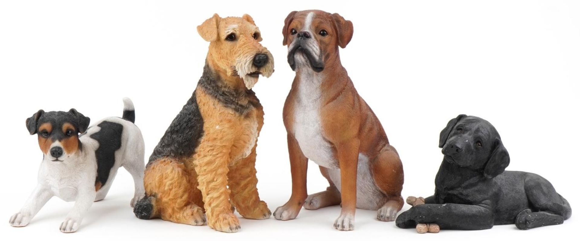 Four large decorative model dogs including Sandicast Labrador pup and Hotant Jack Russell 46cms high