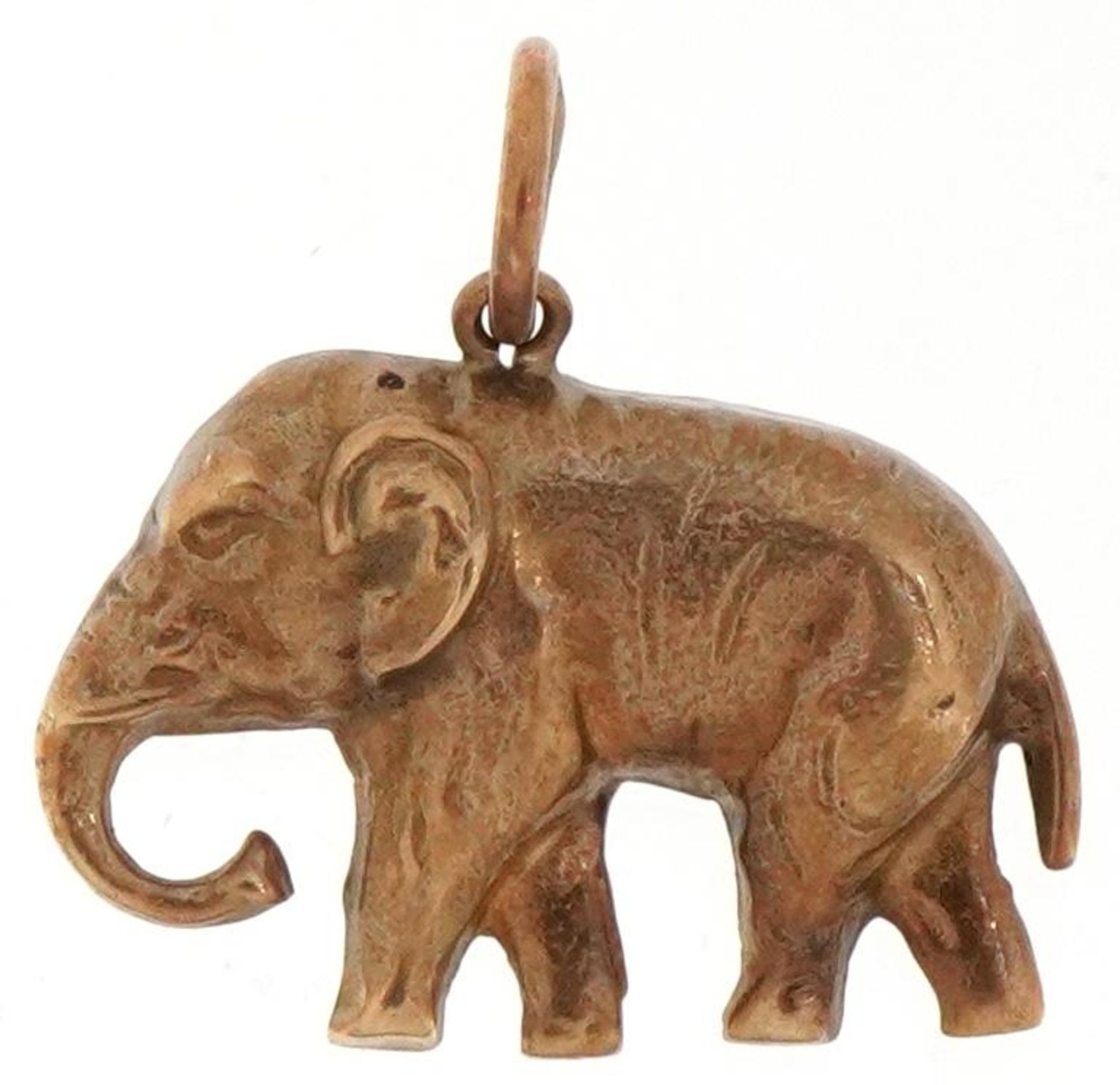 9ct gold charm in the form of an elephant, 1.9cm in length, 1.1g